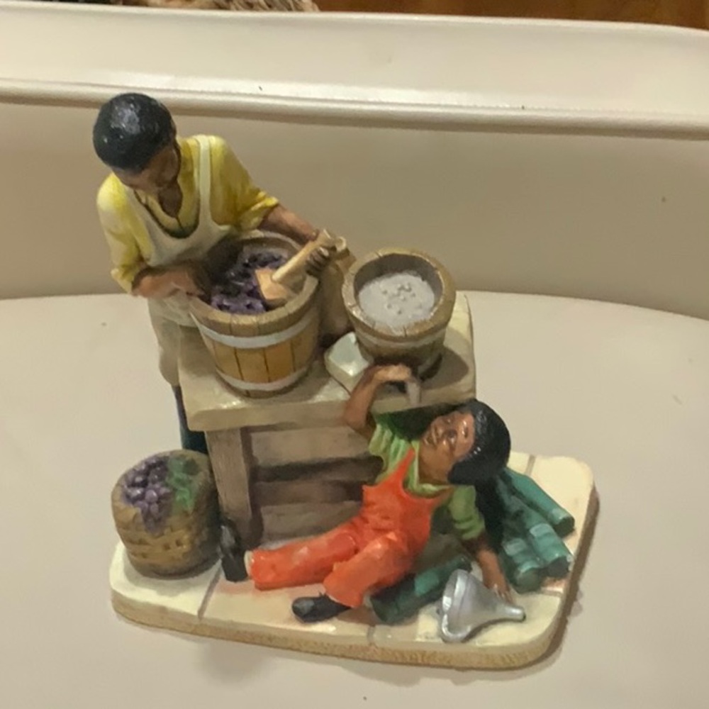 African American figurine Wine Tasting